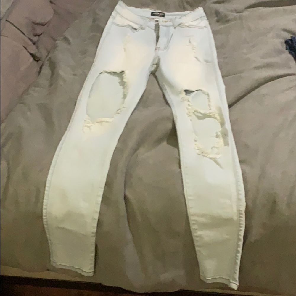 Fashion Nova Light wash destroyed jeans